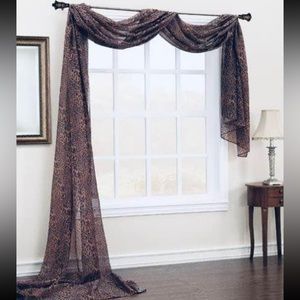 Sheer cheetah print window scarf treatment